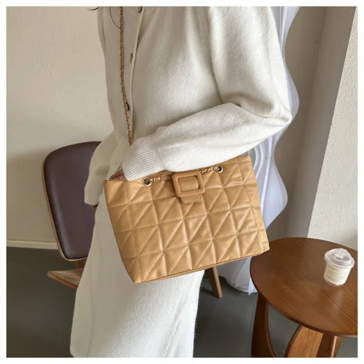 Women shoulder bag in trapezoid shape with chain strap, PU material, three-dimensional pocket, available in black white khaki brown