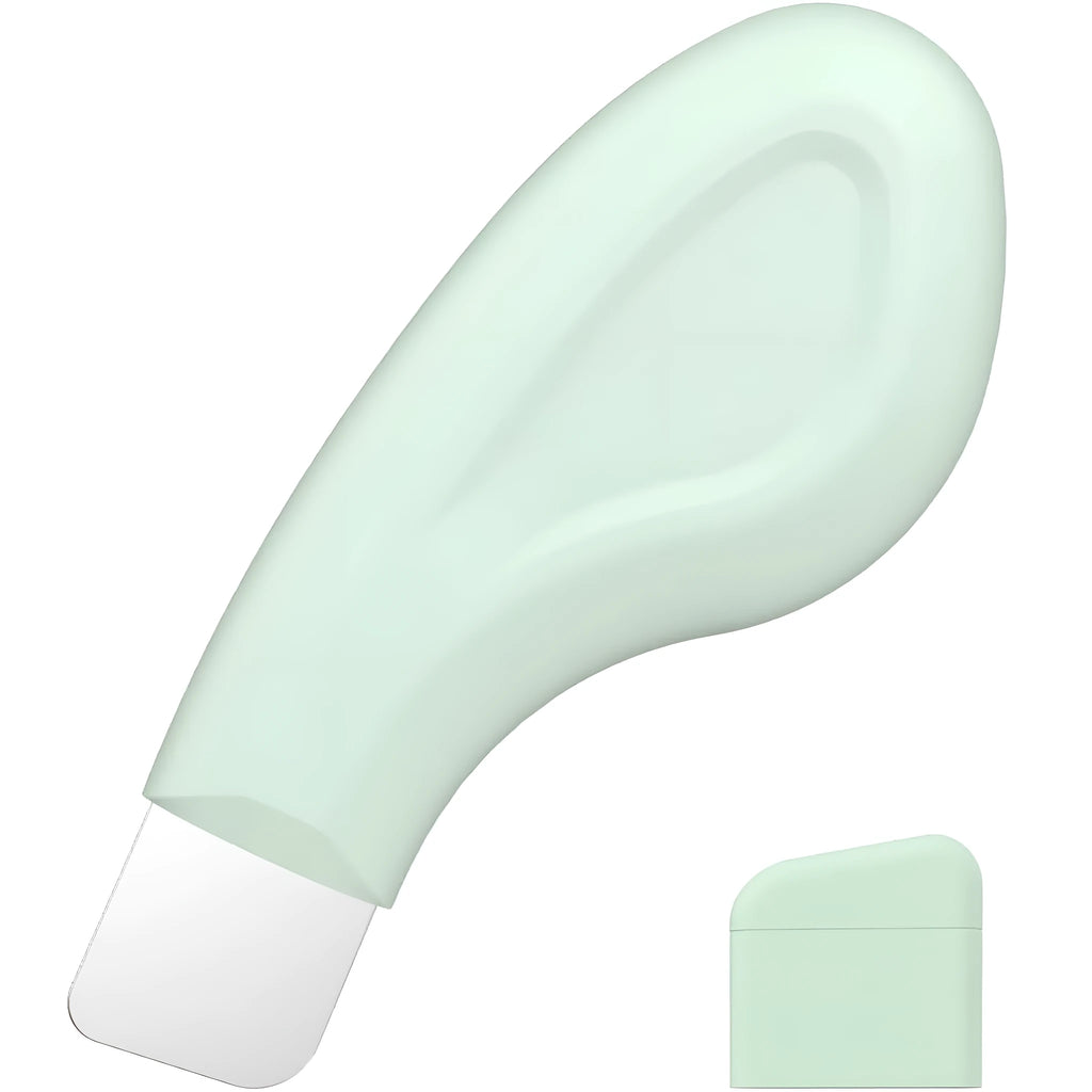 Green stainless steel pore scraper face spatula with a non-slip handle for blackhead removal.