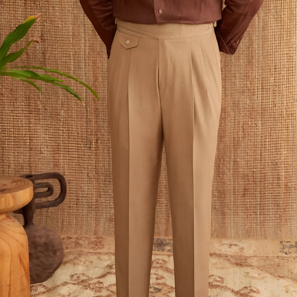 Man wearing dark grey slim fit straight leg polyester business trousers.