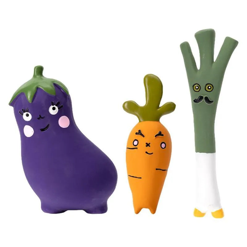 Latex vegetable dog chew toys showing cartoon onion and eggplant designs in green, orange and purple colours