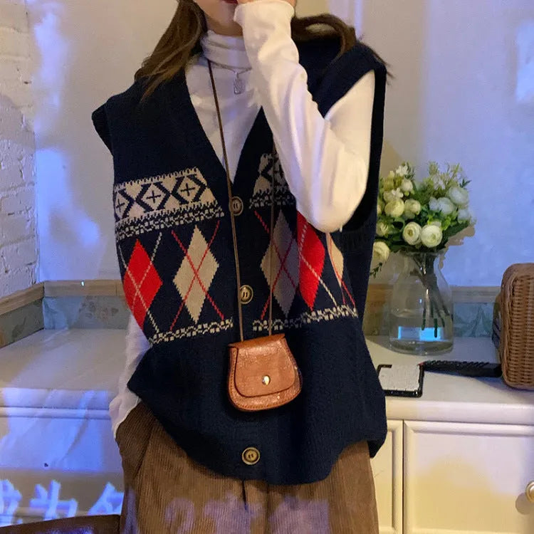 Khaki diamond plaid pattern sleeveless loose cardigan on a hanger