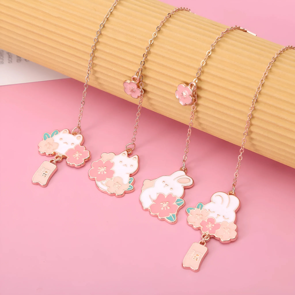 Metal pendant bookmark with cherry blossom cat design and sakura motifs