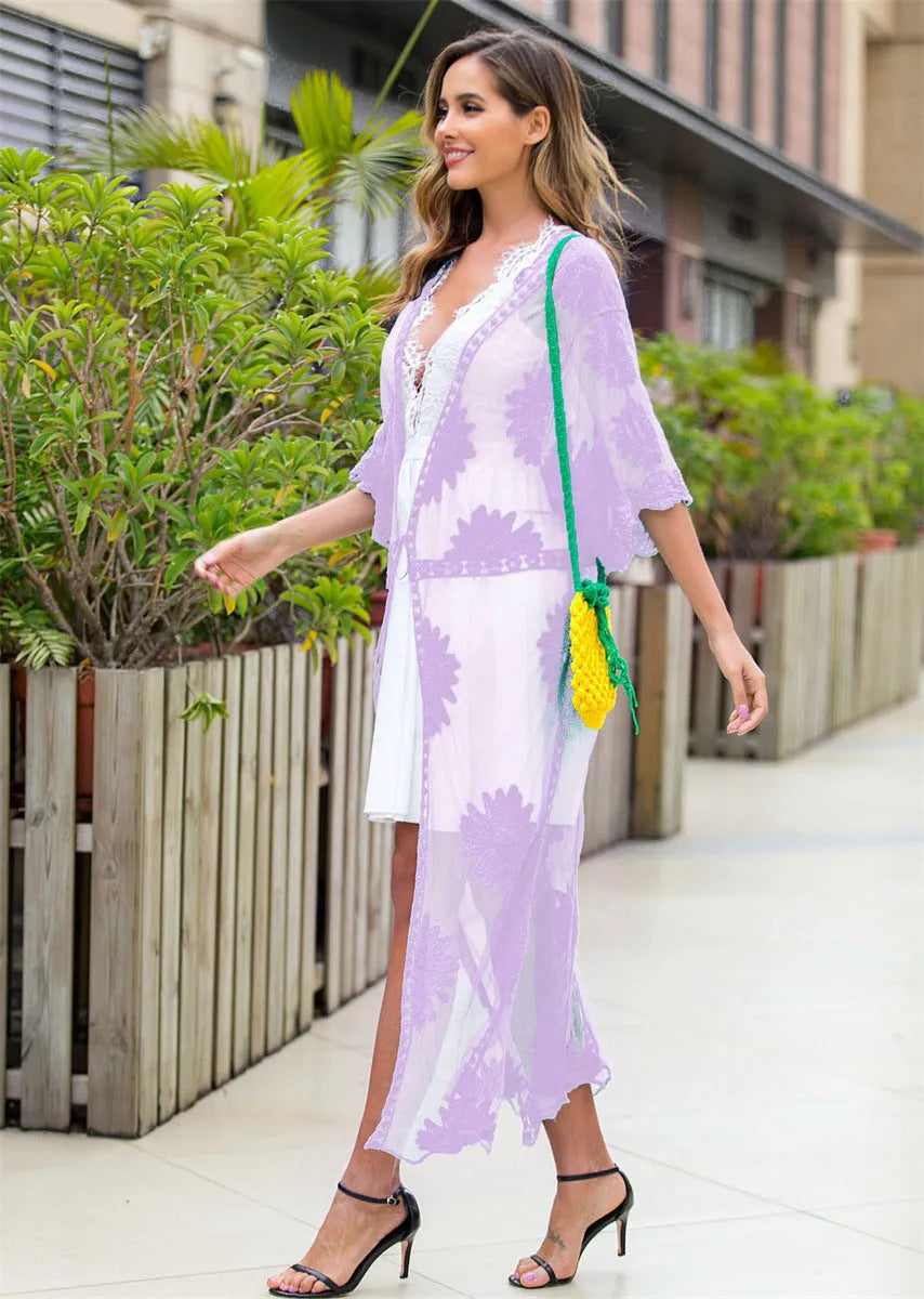 Light purple lace embroidery beach dress swimsuit cover-up on a hanger.