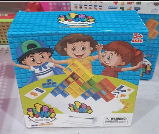Plastic balance stacking game with 16 colourful building blocks on chassis