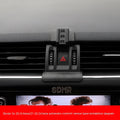 Snap-on car phone bracket mounted on Skoda air vent for secure mobile phone holding