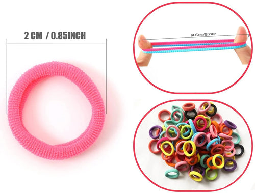 Multicoloured assortment of 100 soft cotton baby hair ties in a small jar, showing seamless design.