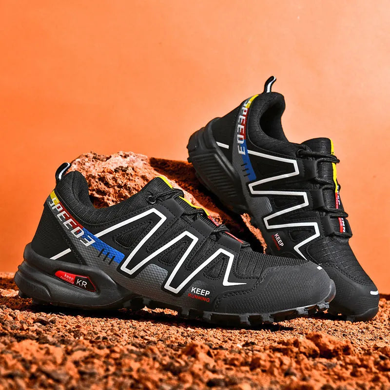 Men's low-top casual shoes in grey-orange, synthetic leather upper with mesh lining, on a rubber sole.