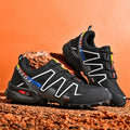Men's low-top casual shoes in grey-orange, synthetic leather upper with mesh lining, on a rubber sole.