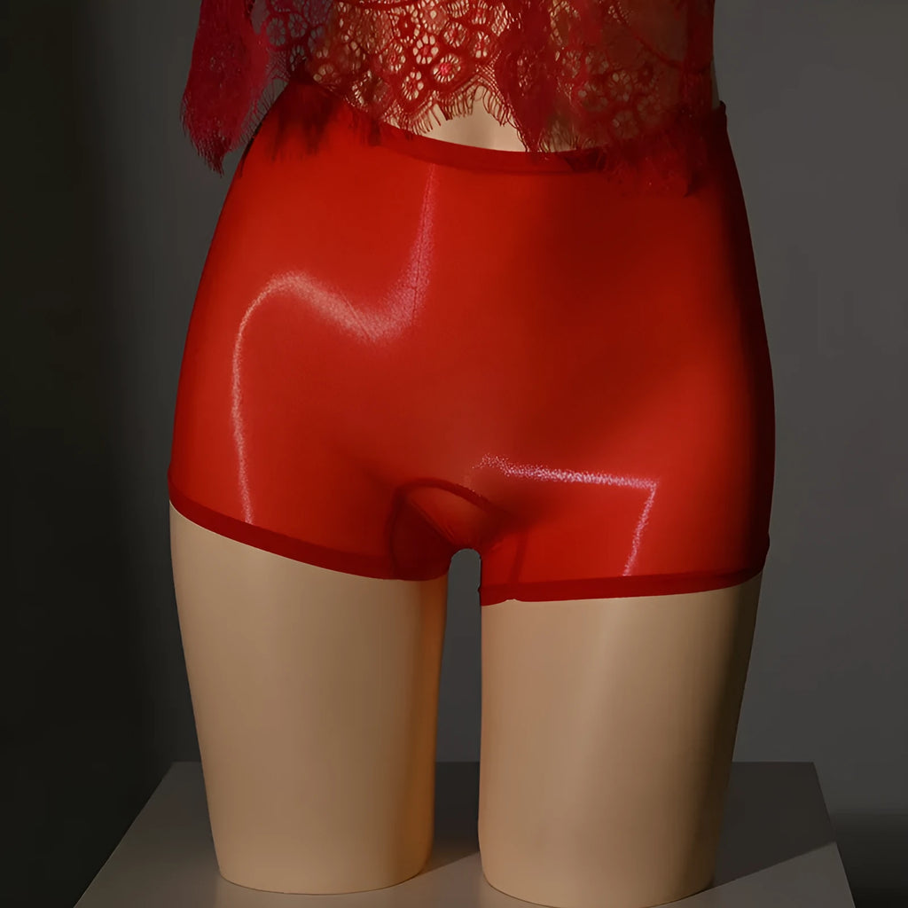 Shiny red men's underwear stockings with a mid waist design on a neutral background