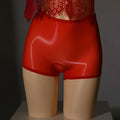Shiny red men's underwear stockings with a mid waist design on a neutral background
