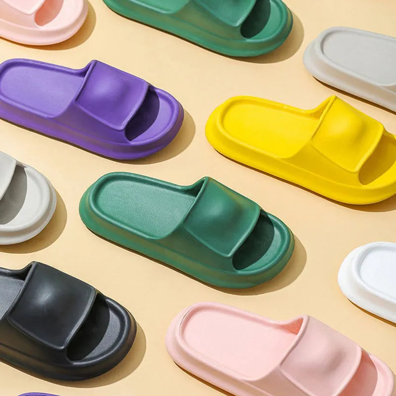 A pair of soft EVA bathroom slippers with a thick, non-slip sole, shown in a choice of colours.