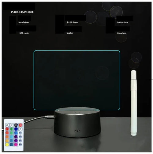 3D acrylic LED message board night light with remote control and marker pen on a desk.