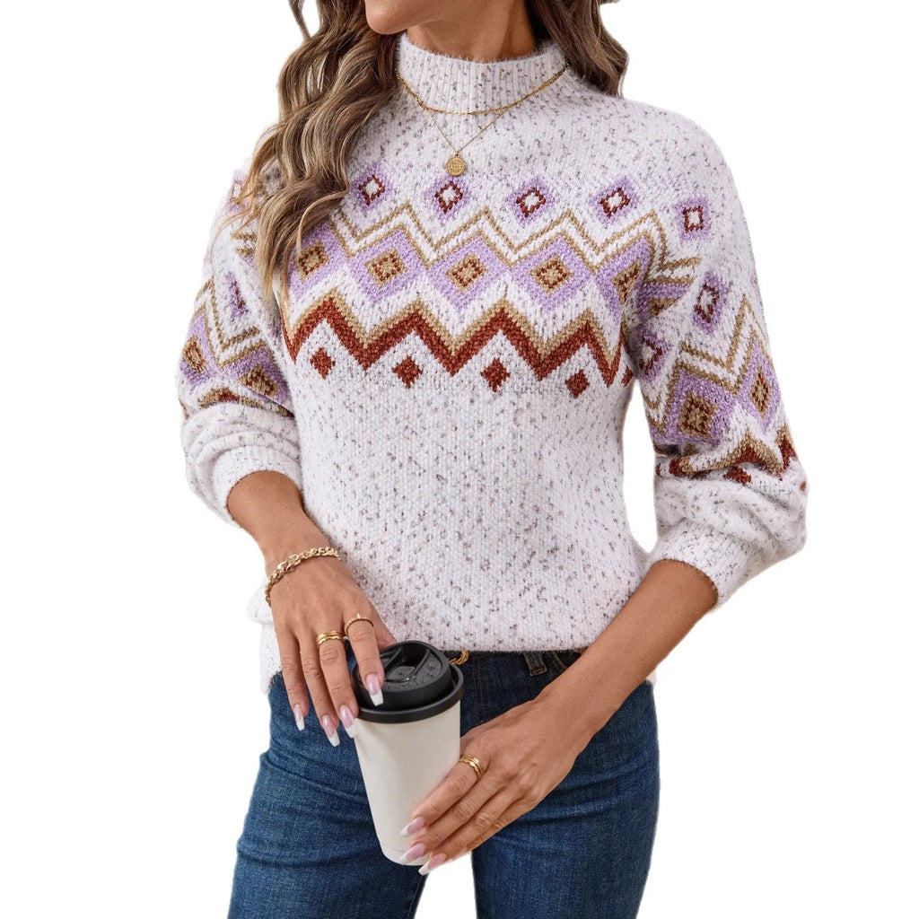 White women's loose geometric jacquard sweater with half turtleneck on hanger
