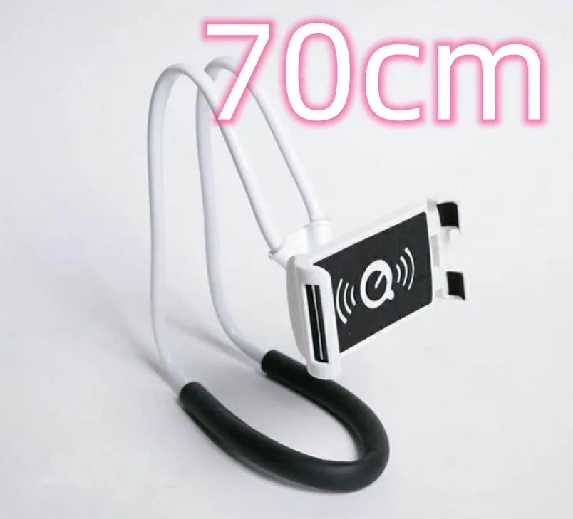 White plastic and foam 360-degree rotatable universal phone holder on a table.