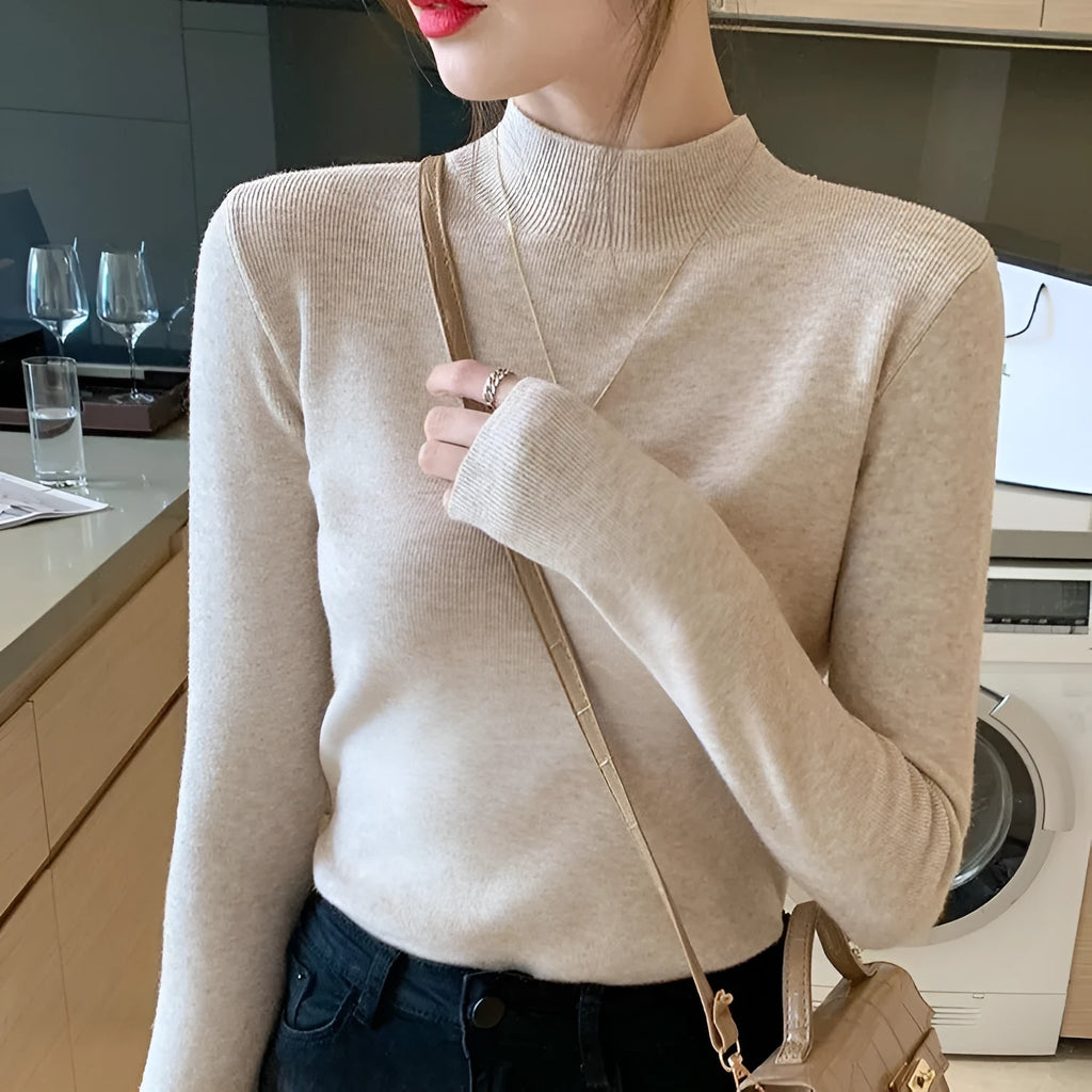 Western style slim fit long sleeve pullover shirt in viscose fibre on a hanger.