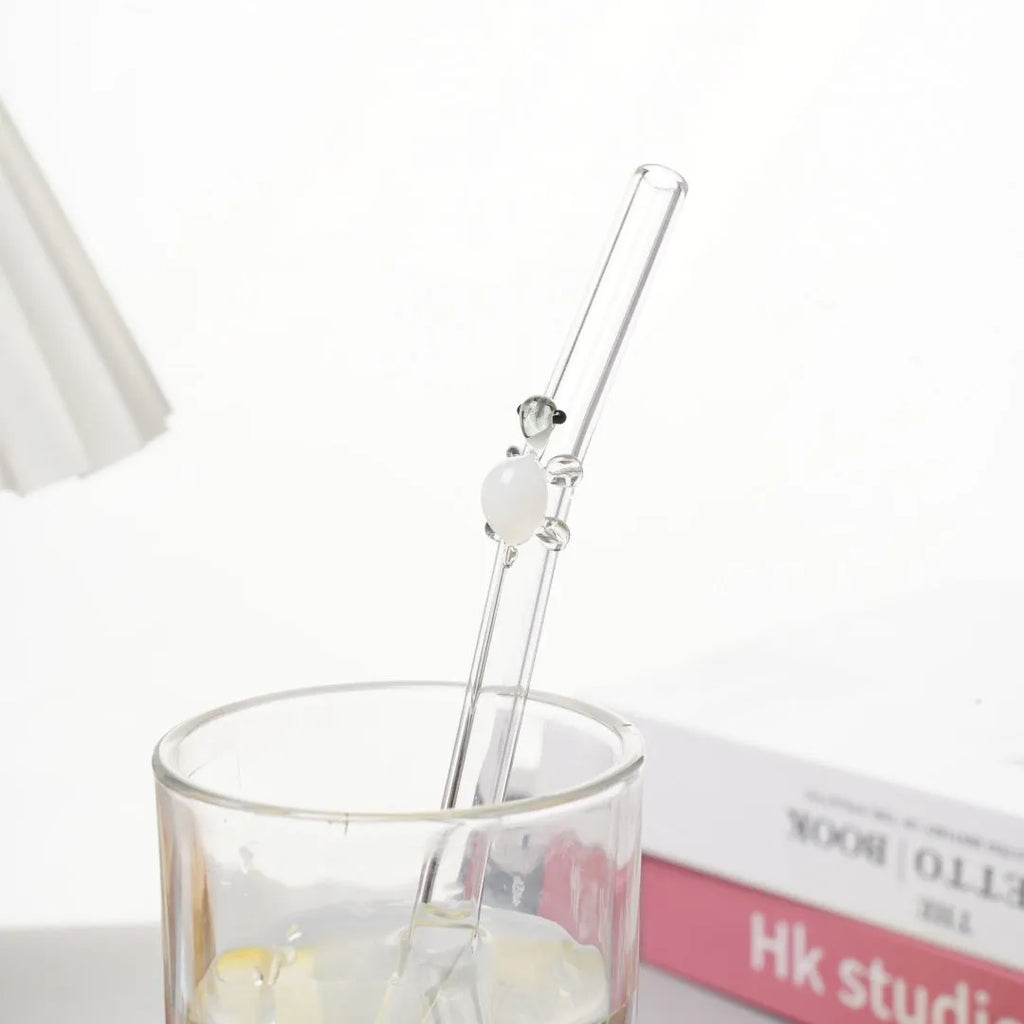 Set of four high borosilicate glass turtle elbow straws in pink green purple and yellow for children