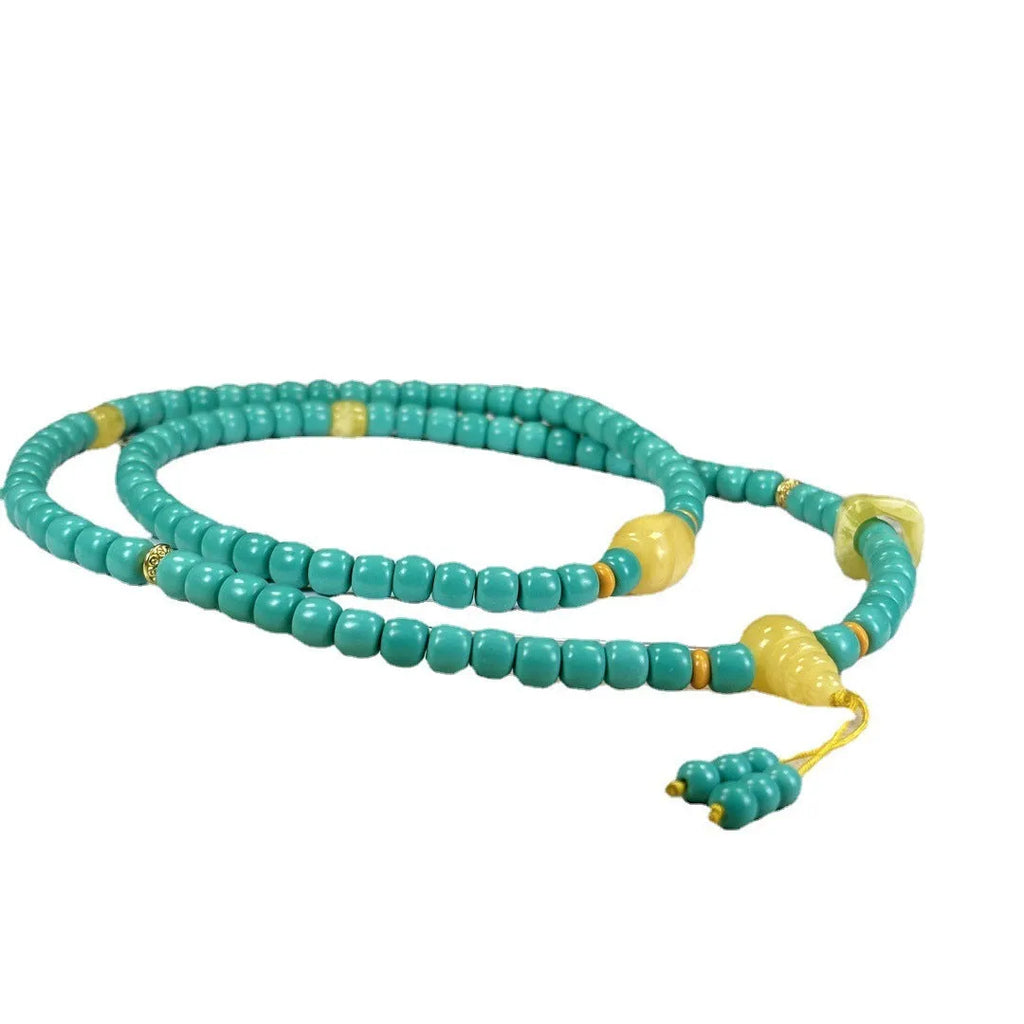 Turquoise stone mesh flower lucky pendant on an adjustable ball bead necklace chain.