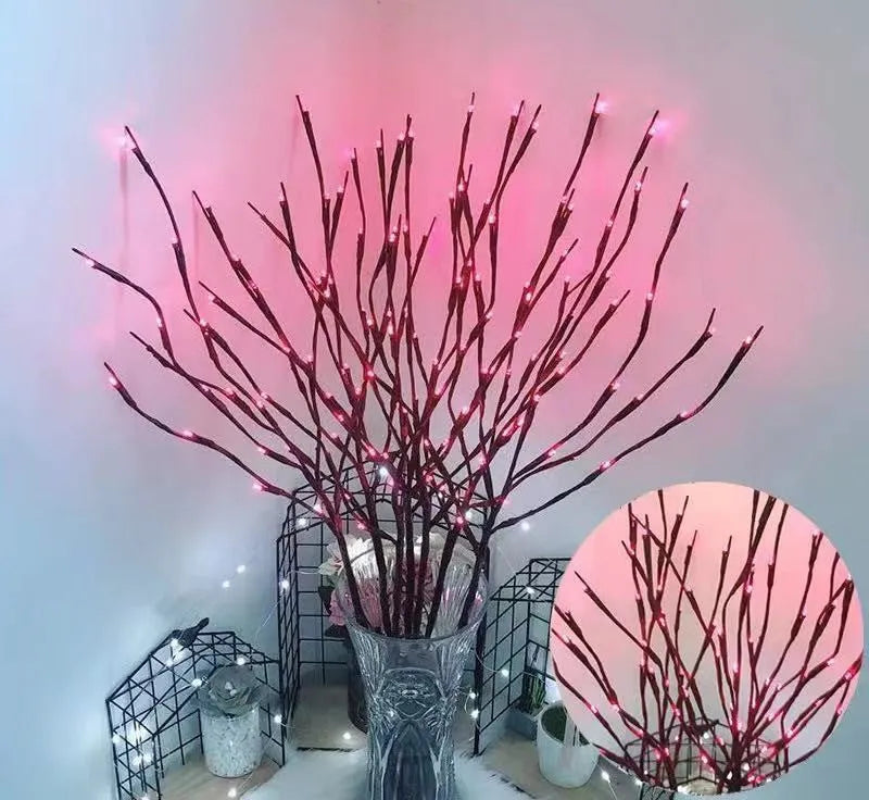 LED decorative tree light in a vase with colourful or warm white lighting options.