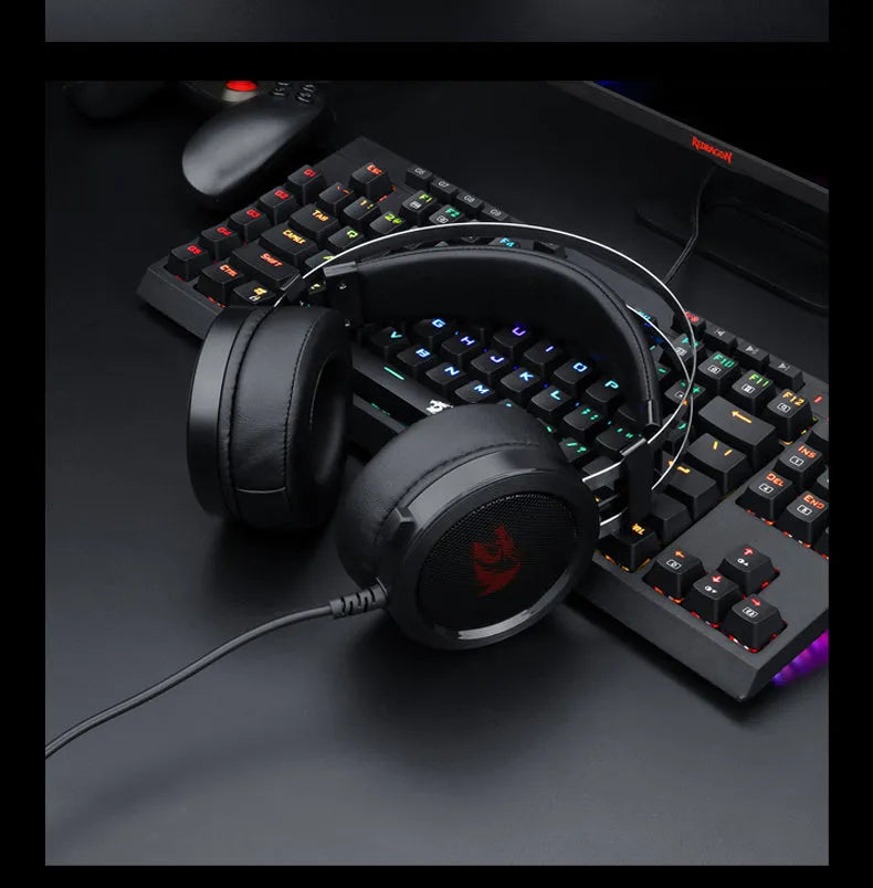Black wired computer gaming headset with a 3.5mm plug and long cable.