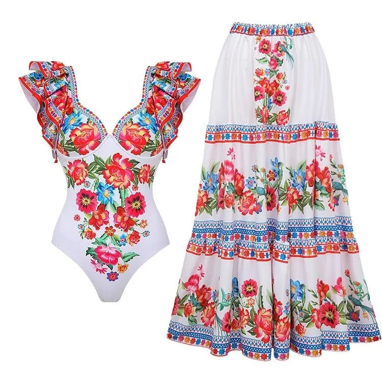 Women's printed one-piece polyester swimsuit in a red apron set design on a hanger.