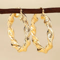 Women's geometric ring design ear clips in electroplated copper with drop-shaped modelling