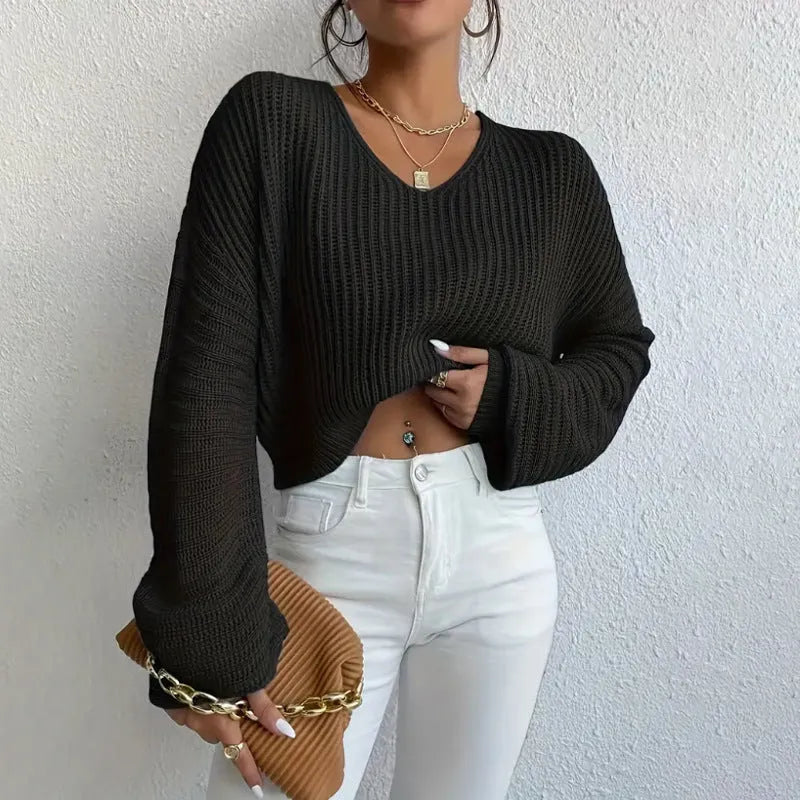 Women's solid colour long sleeve polyester pullover casual top shown in available colours.