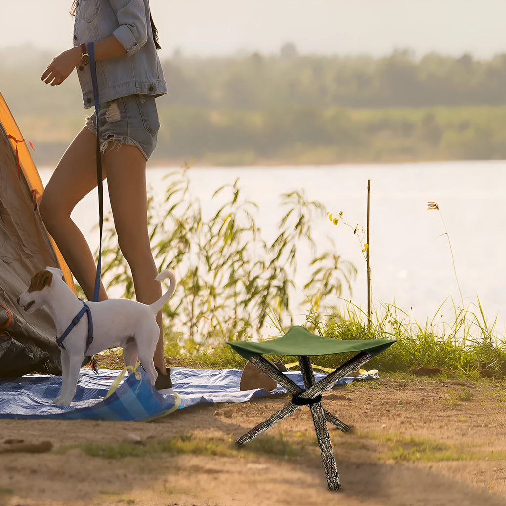 Folding portable camping stool with triangular fabric seat in black for outdoor use