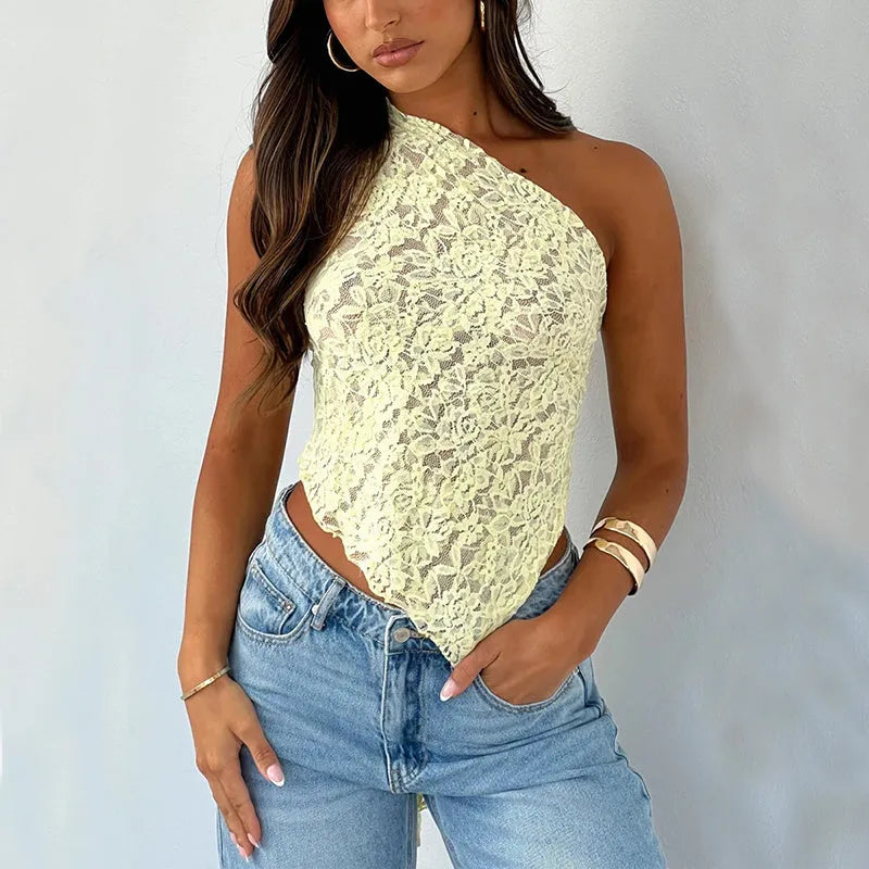 Women's apricot lace backless sleeveless vest top with asymmetrical neckline on a hanger.