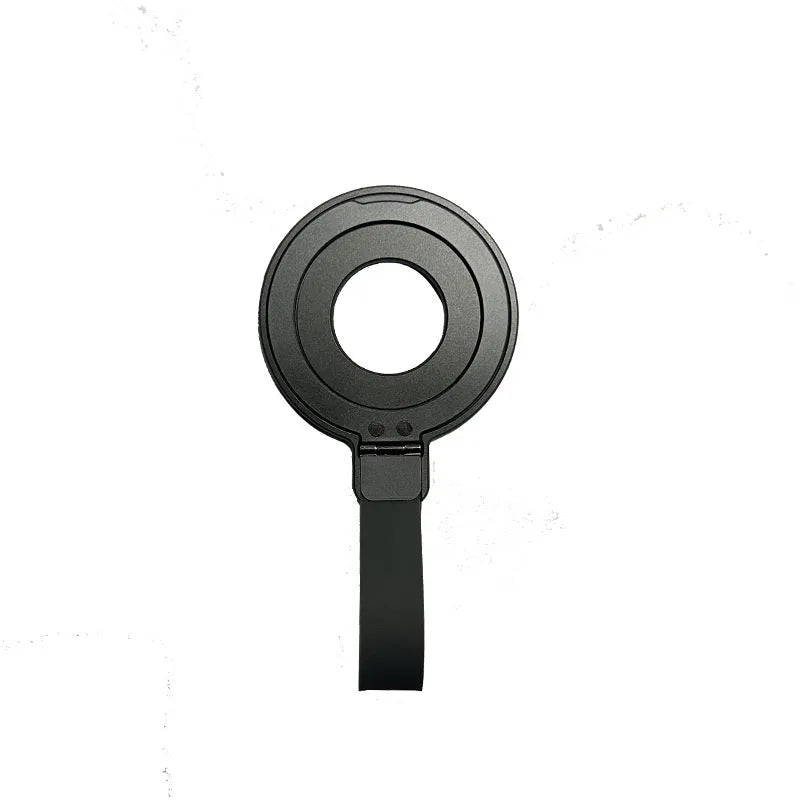 Portable magnetic wrist strap round silicone bracket phone holder in black on a wrist