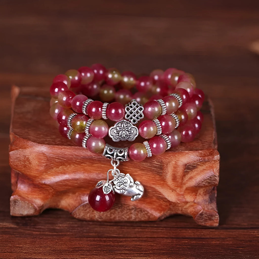 Handmade natural watermelon crystal bracelet with Chinese knotting in elephant style geometric design
