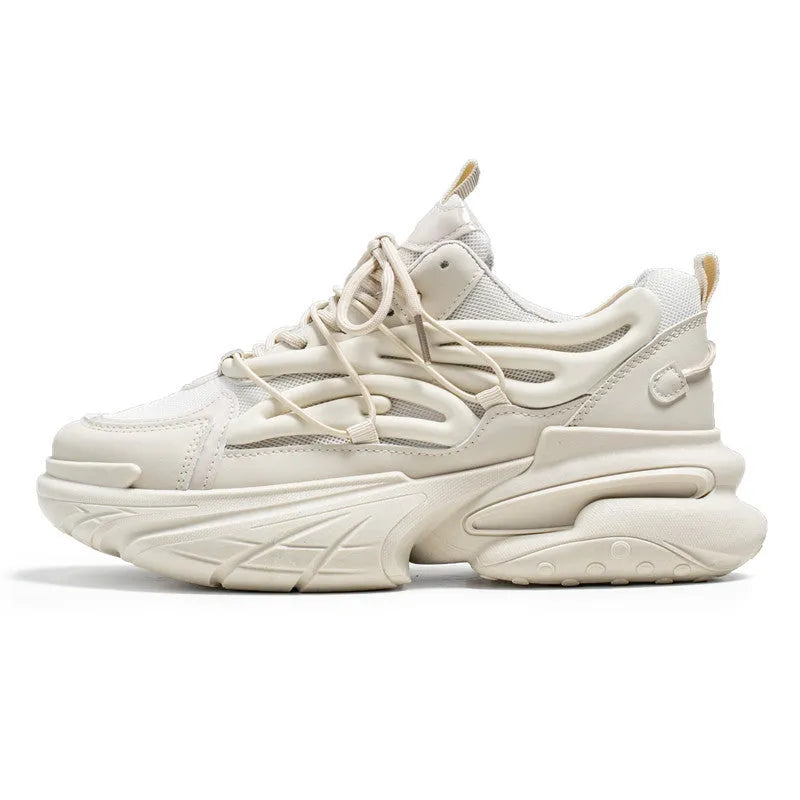 Men's beige and black sneakers with mesh upper, lace-up front, and rubber sole