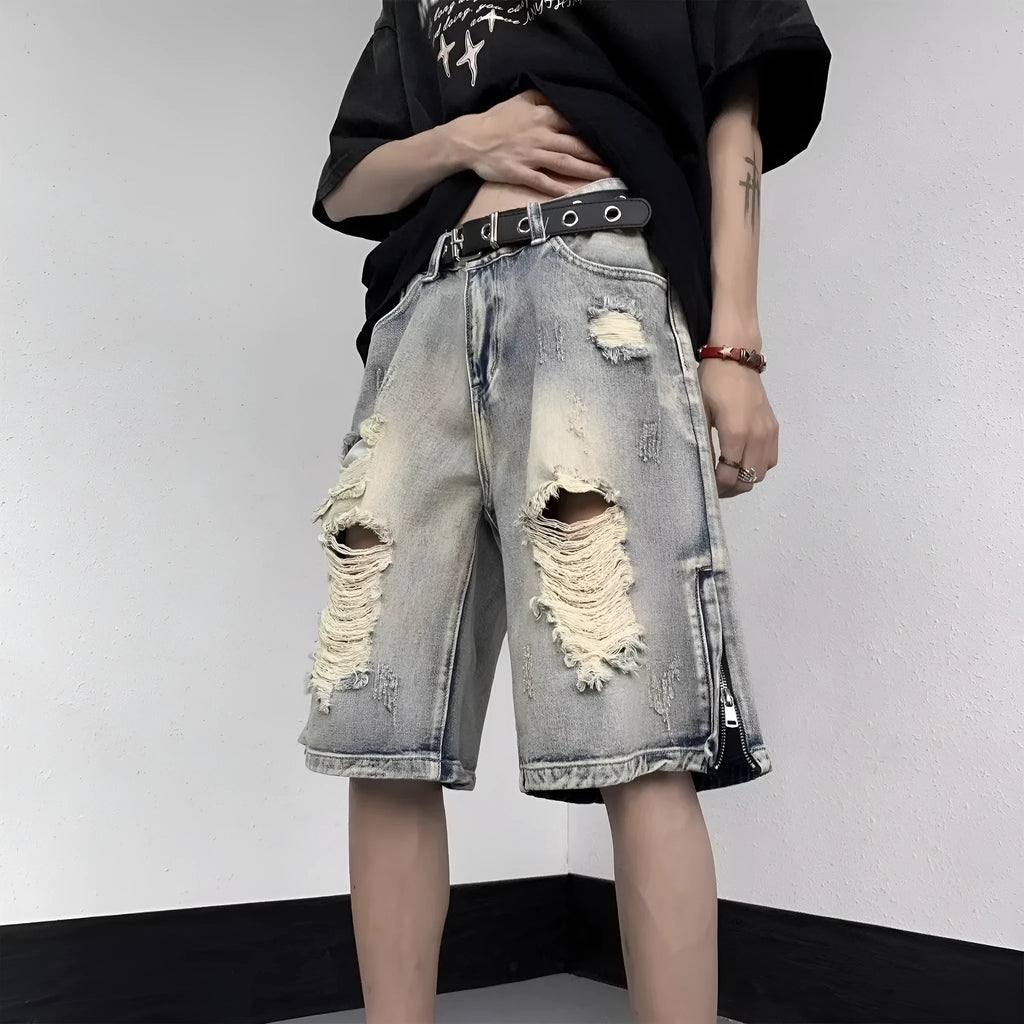 Blue retro-style denim shorts with a loose wide-leg cut and tattered detailing.