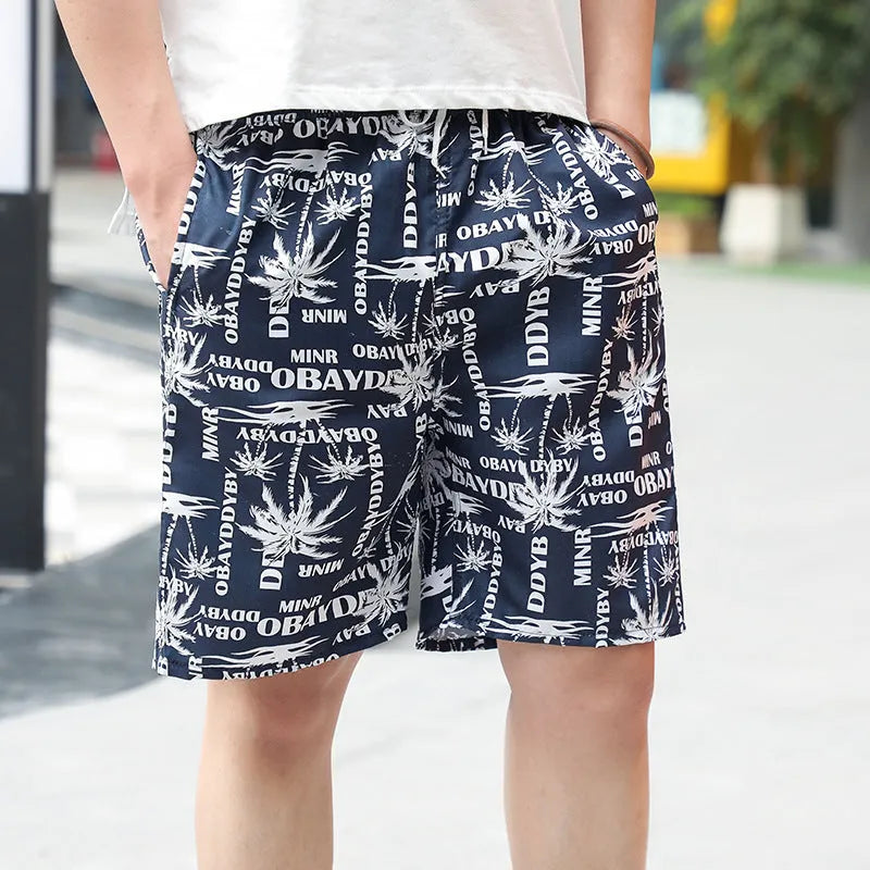 Men's floral print five-point swimming trunks in polyester fabric for pool and beach use