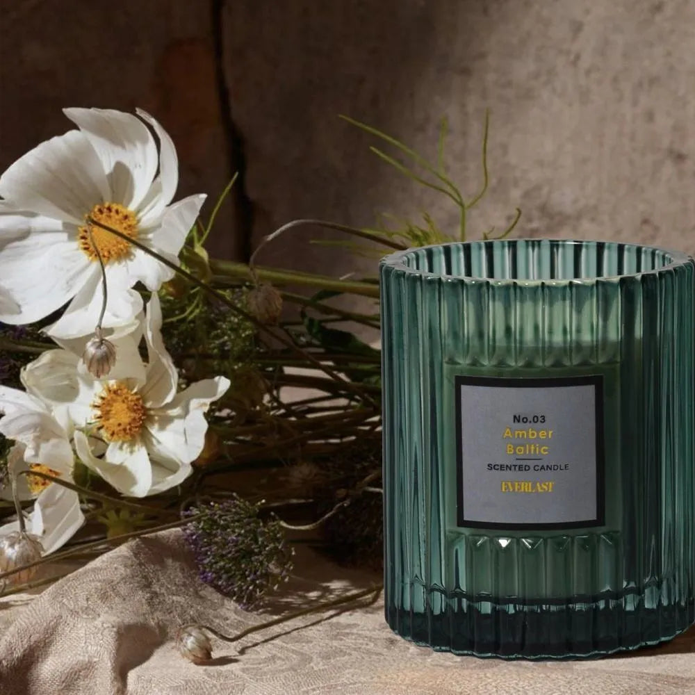 Soy wax aromatherapy candle in cylindrical shape for home decoration available in amber green and red
