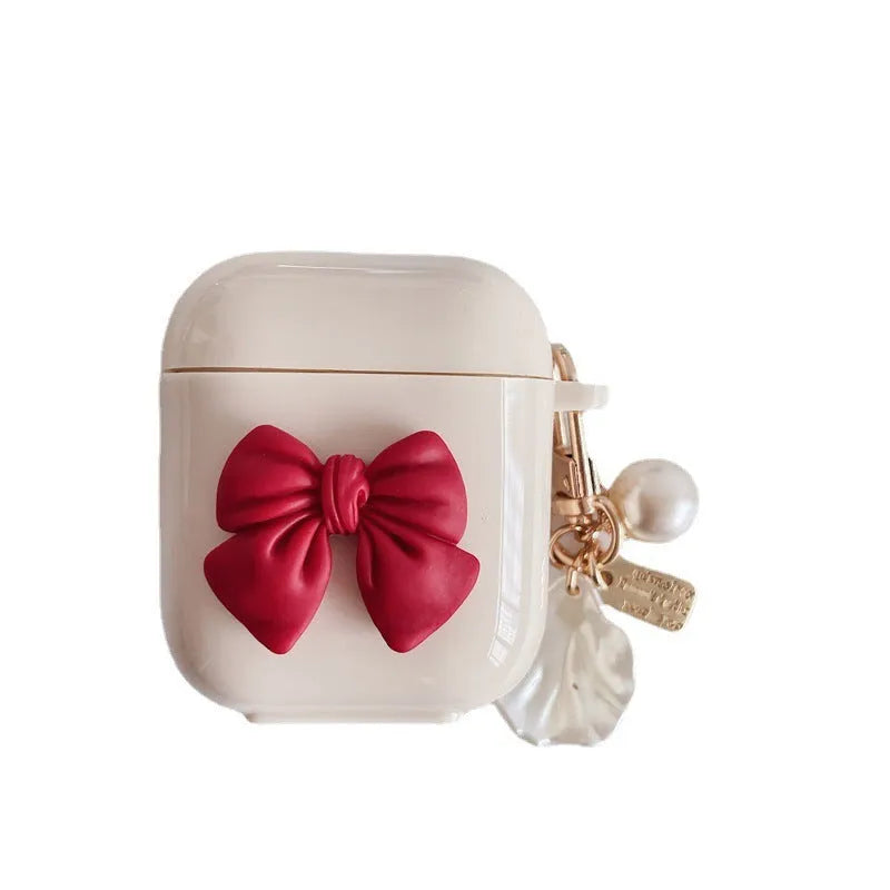 Beige red bow shell pendant TPU case for Apple AirPods wireless earphones with clamshell design
