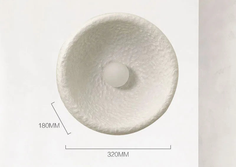 Japanese-style minimalist wall lamp with resin shade in three diameter sizes for modern interiors