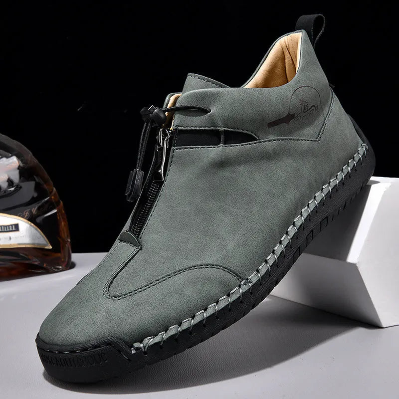 Men's casual leather shoes in green with round toe, rubber sole, and mid heel.