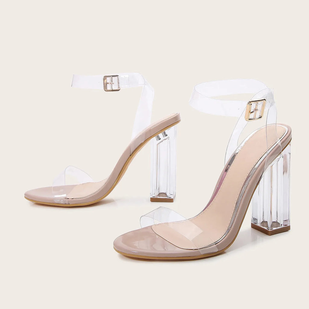 Apricot women's sandals with transparent glass heel and buckle closure.