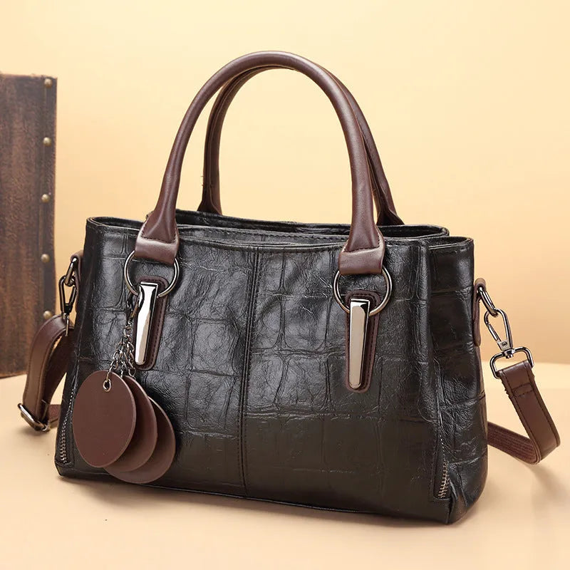 PU leather shoulder bag in vintage brown colour with internal organiser compartments and single strap
