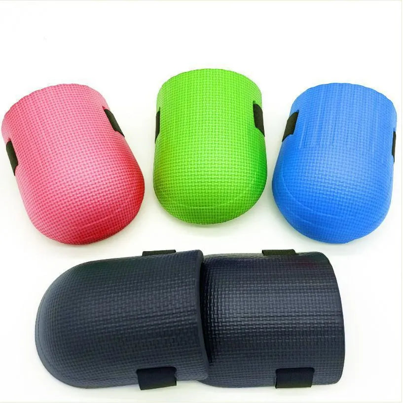 A pair of thick EVA foam kneepads in blue colour for construction and auto repair work.