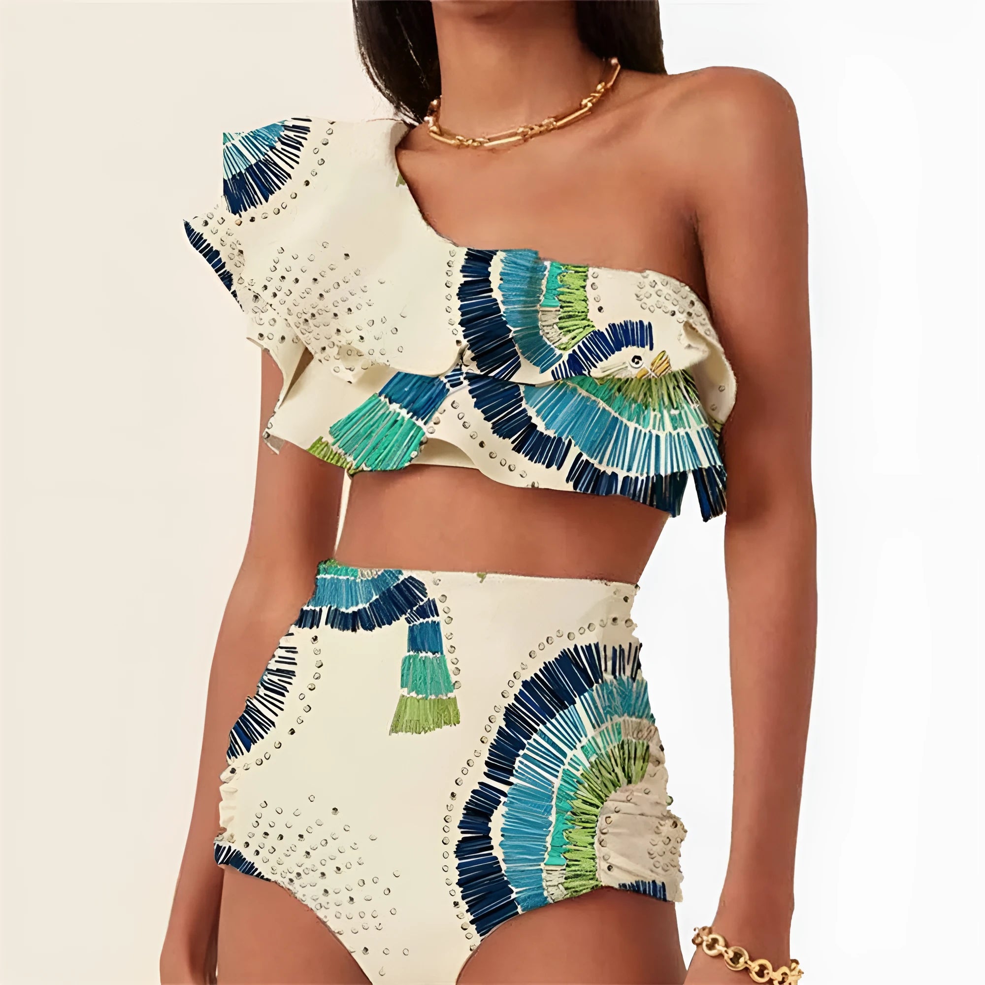 White one-shoulder swimsuit with a tiered, double-layer lotus leaf design skirt on a mannequin.