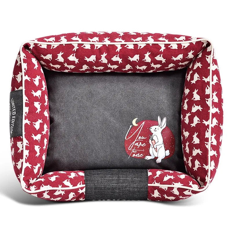 Jarre Aero Bull dog bed in a rabbit colour option shown on a floor