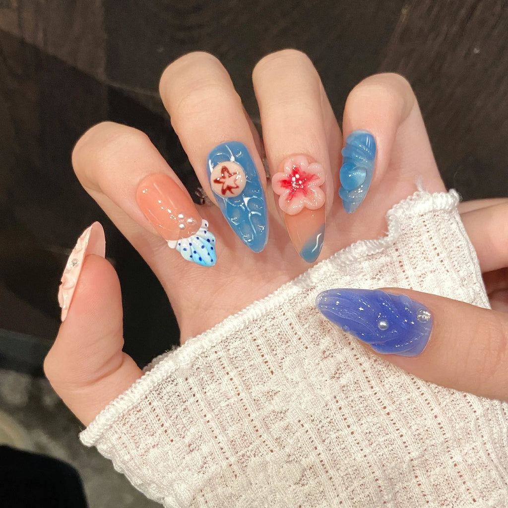 Three-dimensional carved jellyfish plastic wearable armour set in almond nail colour with marine theme