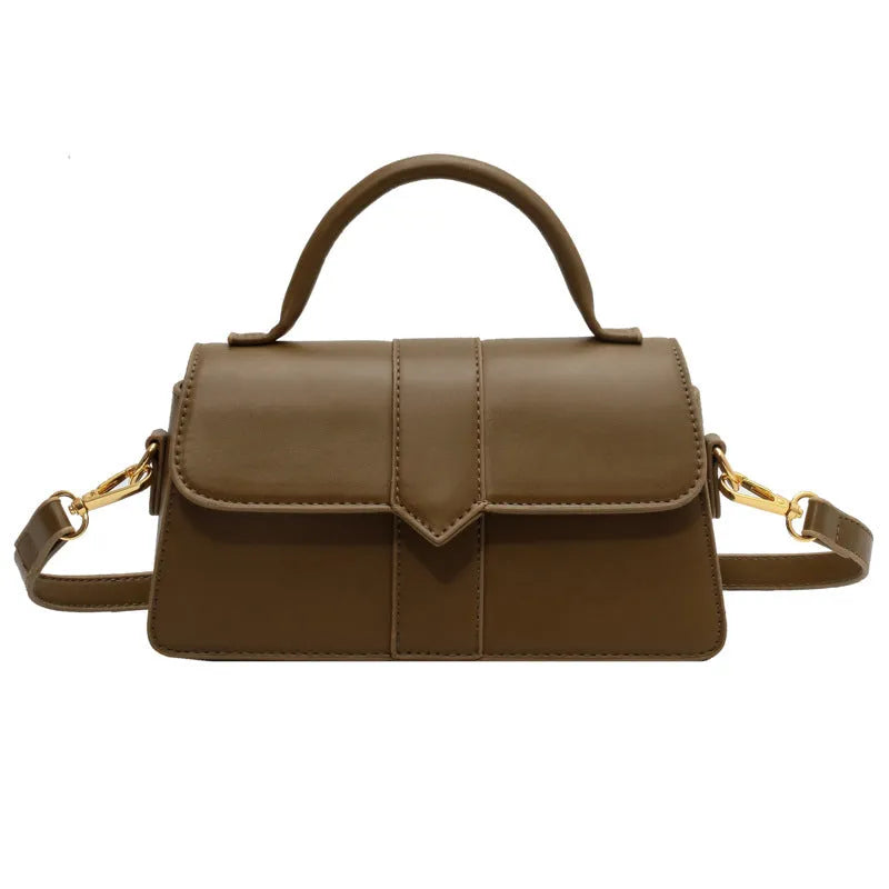 Women's beige PU messenger bag with sandwich pocket and file organiser interior.