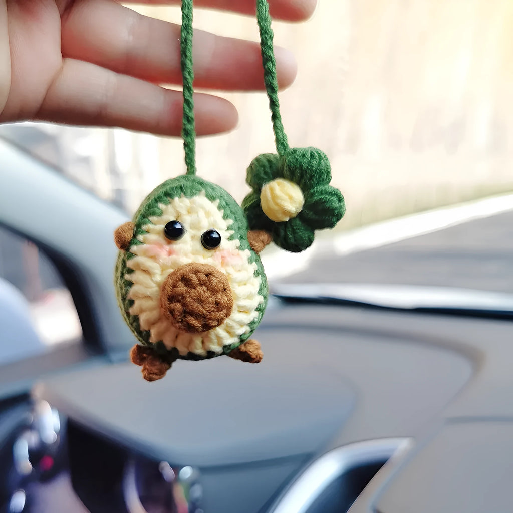 Handmade crocheted wool car pendant with rainbow flower pattern and cartoon avocado design in three colour options