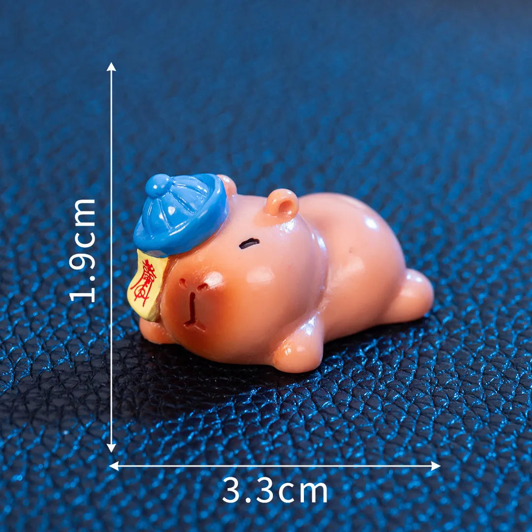 Halloween capybara resin figurine in one of eight designs like pumpkin or vampire.