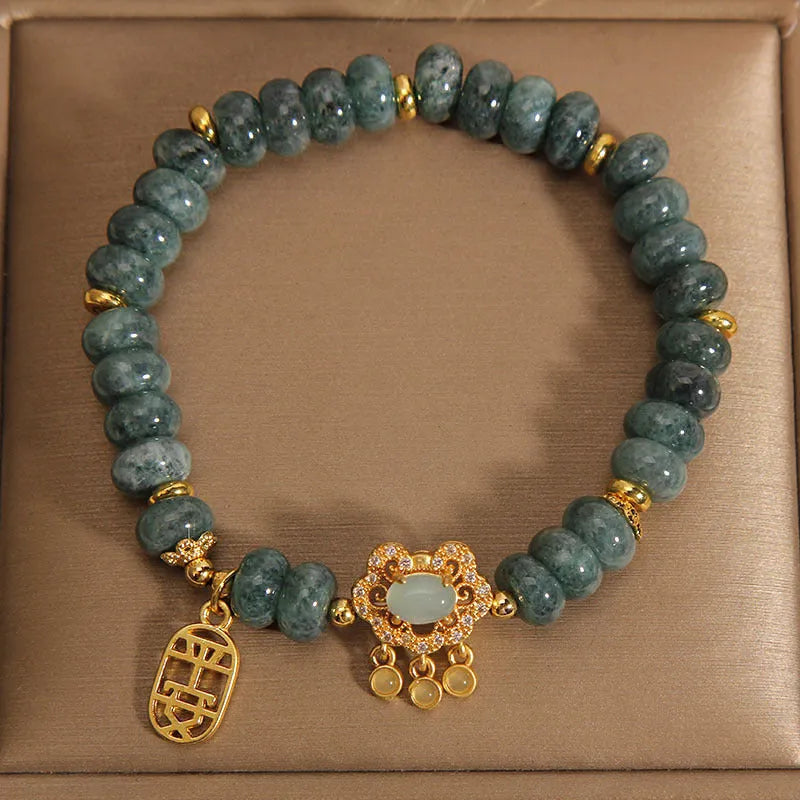 Women's bracelet with emerald jade abacus beads and alloy safety lock clasp