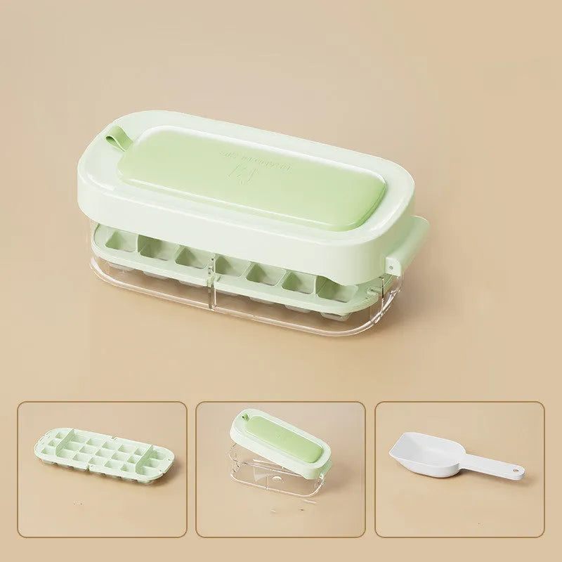 High capacity blue ice cube tray with ice grid and attached storage for the included shovel.