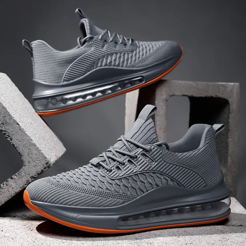 Men's low-top mesh running shoes in black with rubber sole and lace-up front