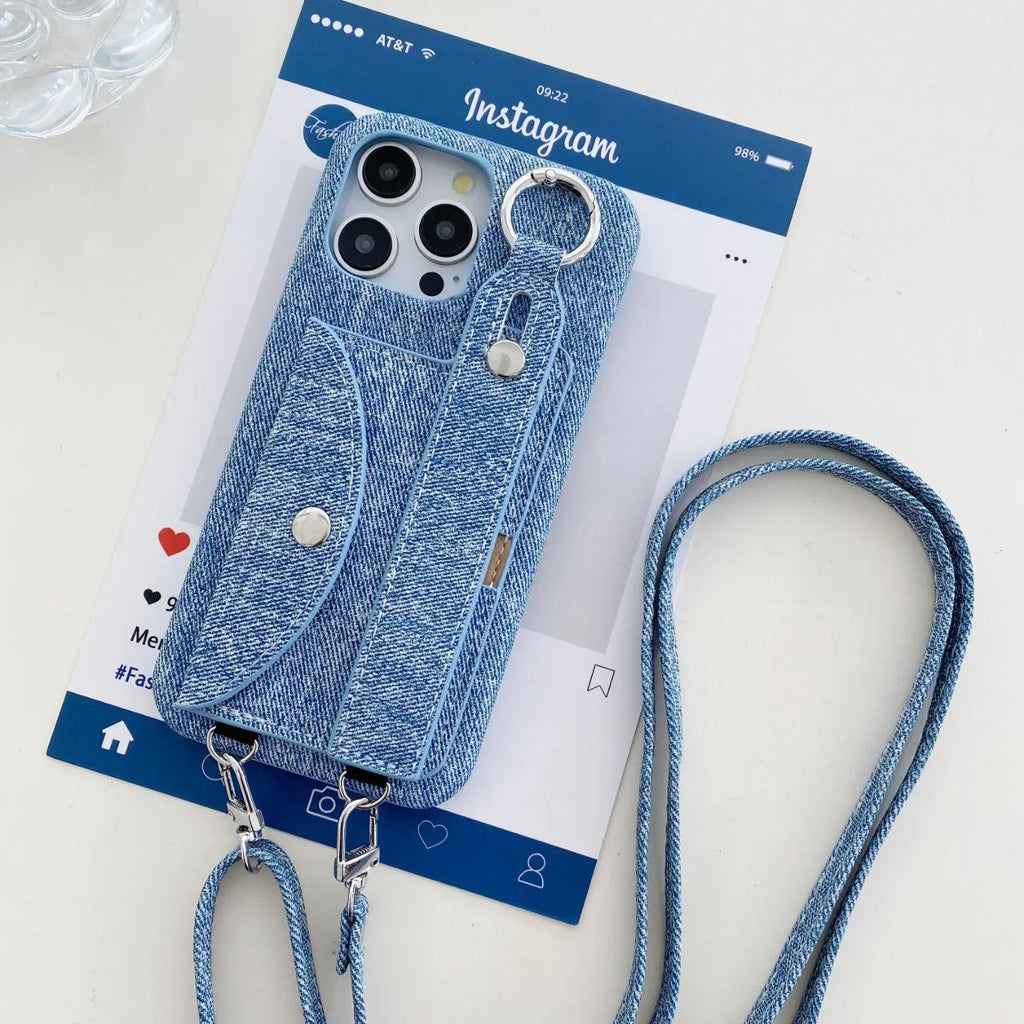 Denim blue leather phone case for iPhone 15 with wrist strap and built-in stand